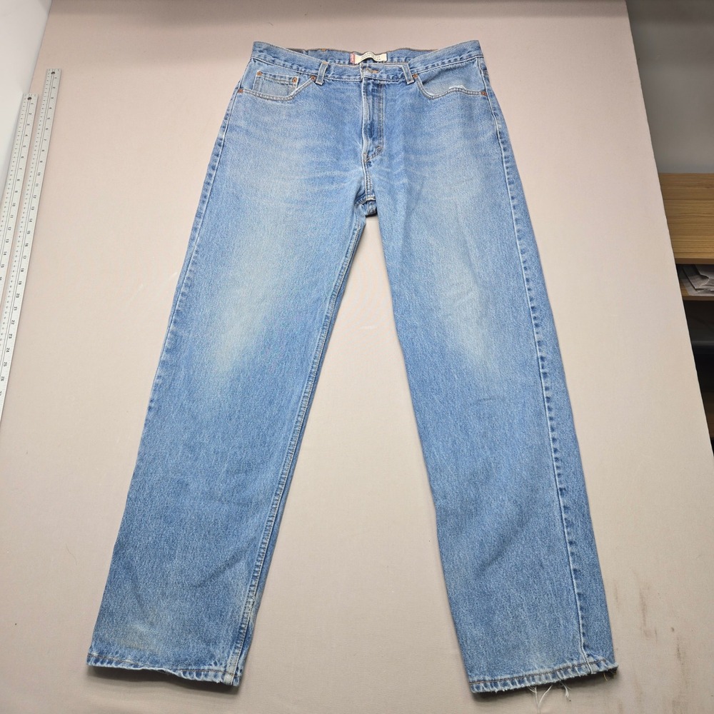 Vintage Levi's 550 Jeans Made in Canada Relaxed Tapered Leg Light Wash Mens 38